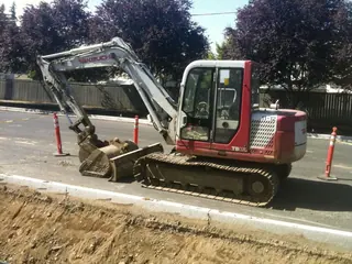 Takeuchi excavator (representative photograph)